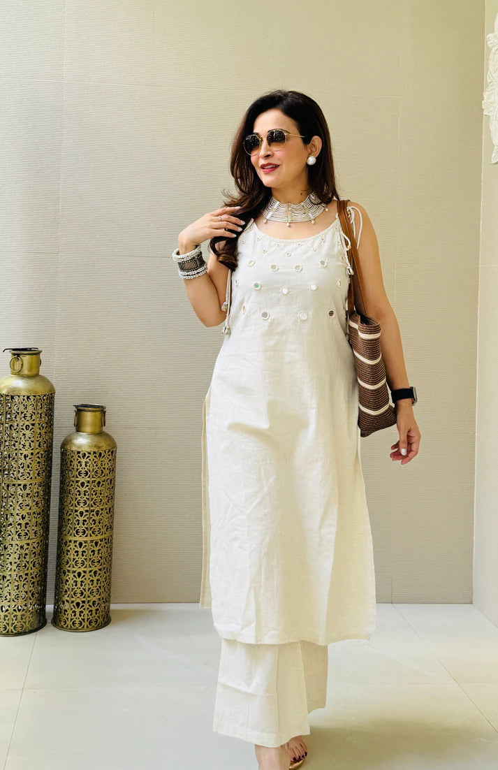 White Sleeveless Kurta Set with White Tassel Embellishments