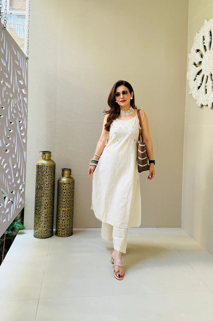 White Sleeveless Kurta Set with White Tassel Embellishments