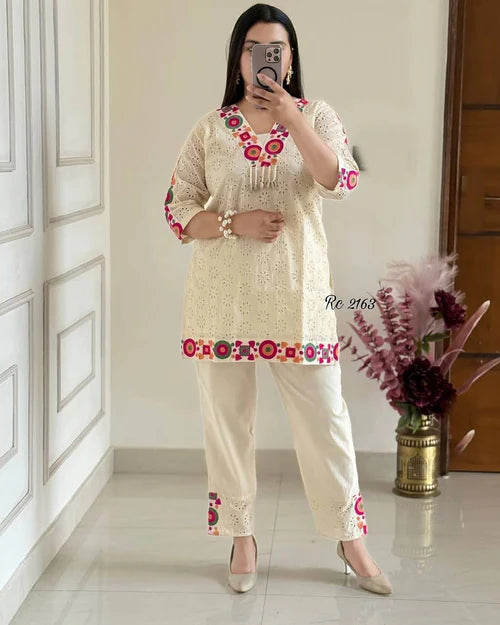 Off-White Cotton Eyelet Kurta Set with Colorful Mirror-Style Embroidery