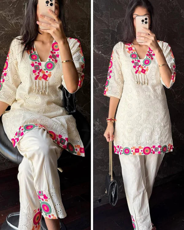 Off-White Cotton Eyelet Kurta Set with Colorful Mirror-Style Embroidery